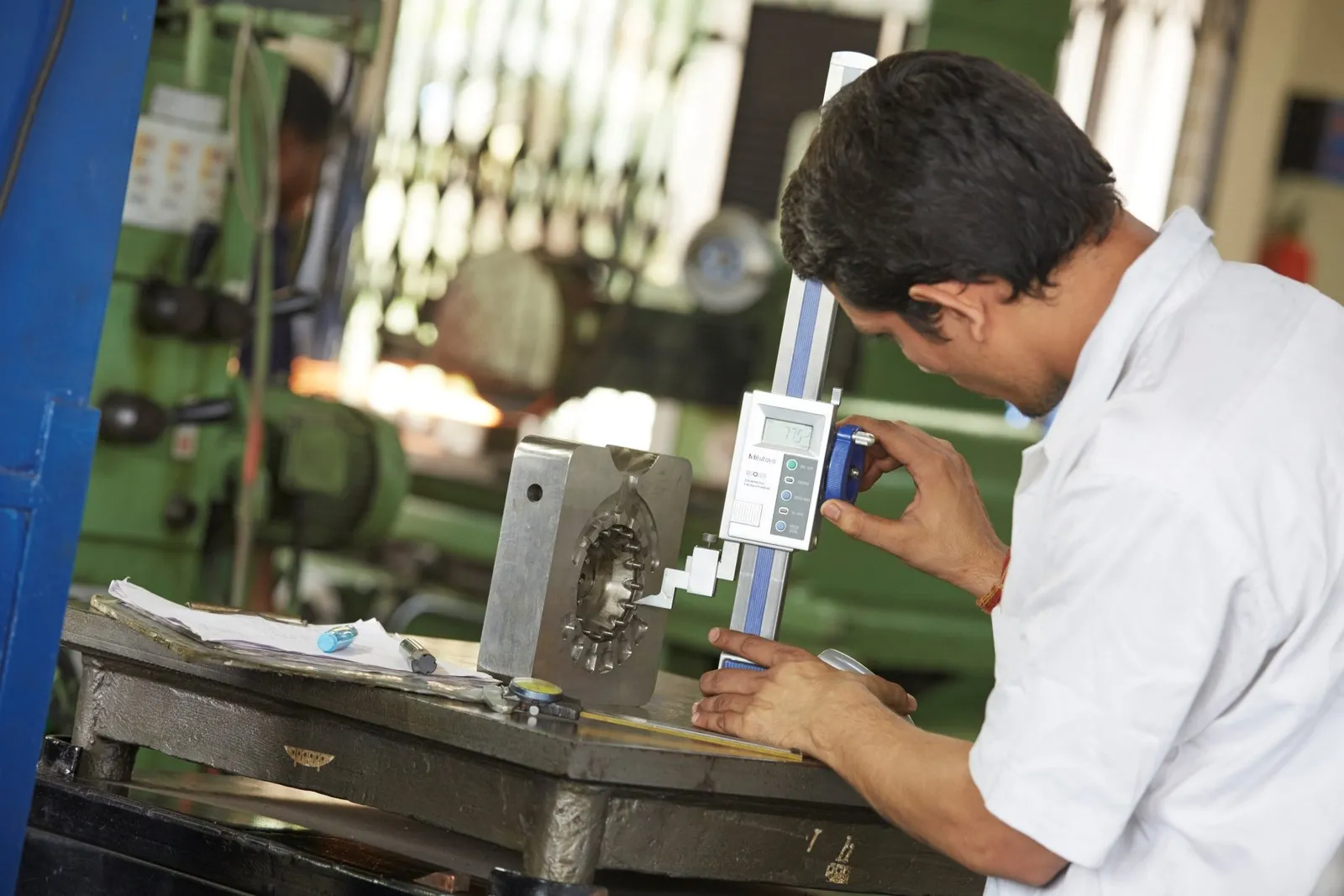 A mould cavity measured on a height gauge during in-process inspection